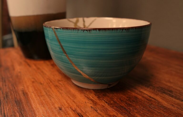 UPSC Mains essay topic Best Lessons Are Learnt Through Bitter Experiences — kintsugi golden repair of a broken bowl as visual metaphor.