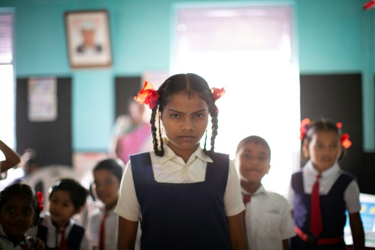 A government school classroom in India with students standing — UPSC Mains essay topic Destiny of a Nation Is Shaped in Its Classrooms.