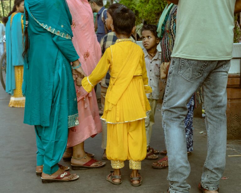 Children holding hands — illustrating UPSC Mains essay topic Girls Are Weighed Down by Restrictions, Boys With Demands.