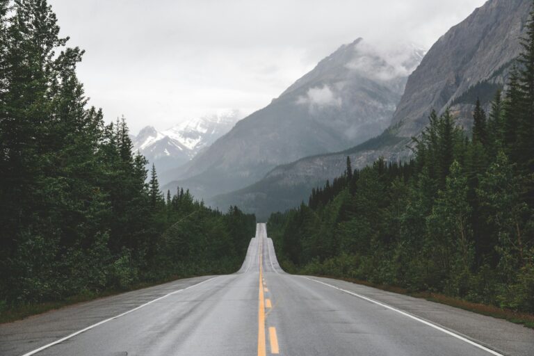 Winding mountain road stretching into distance — UPSC Mains essay topic It Is Best to See Life as a Journey, Not as a Destination