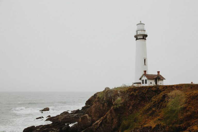 UPSC Mains essay topic Reality does not conform to the ideal but confirms it — lighthouse on rocky cliff