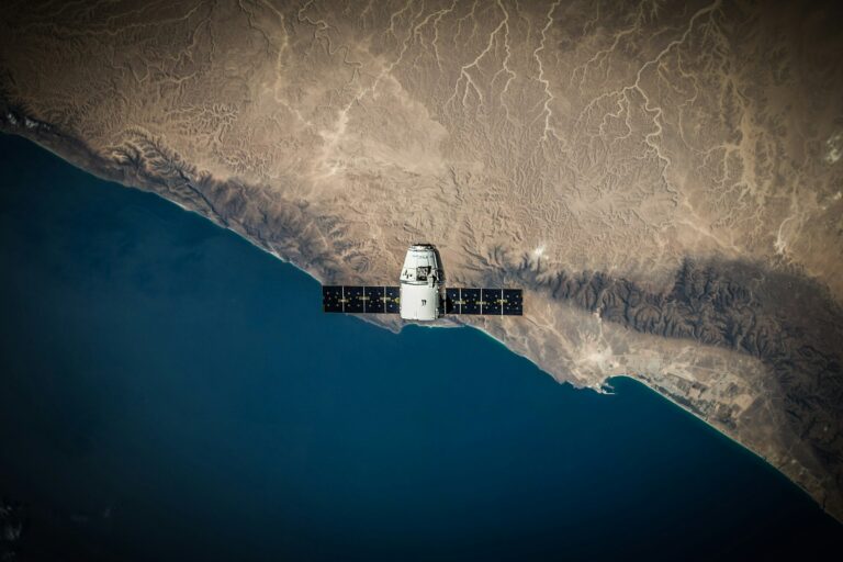 Satellite over coast — UPSC Mains essay topic Technology as the silent factor in international relations