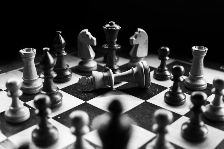 Chess pieces facing each other on a board — UPSC Mains essay topic Thinking Is Like a Game, It Does Not Begin Unless There Is an Opposite Team (2023)