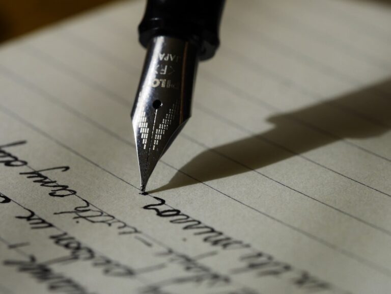 Exam paper and pen on a desk