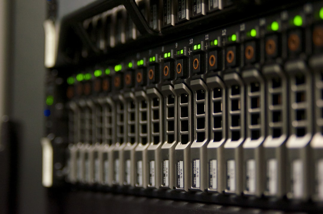 A data-centre server rack with rows of drives and blinking green lights