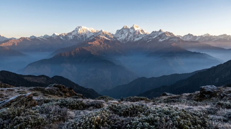 Nanda Devi's twin snow summits rising above Himalayan ridges in Uttarakhand