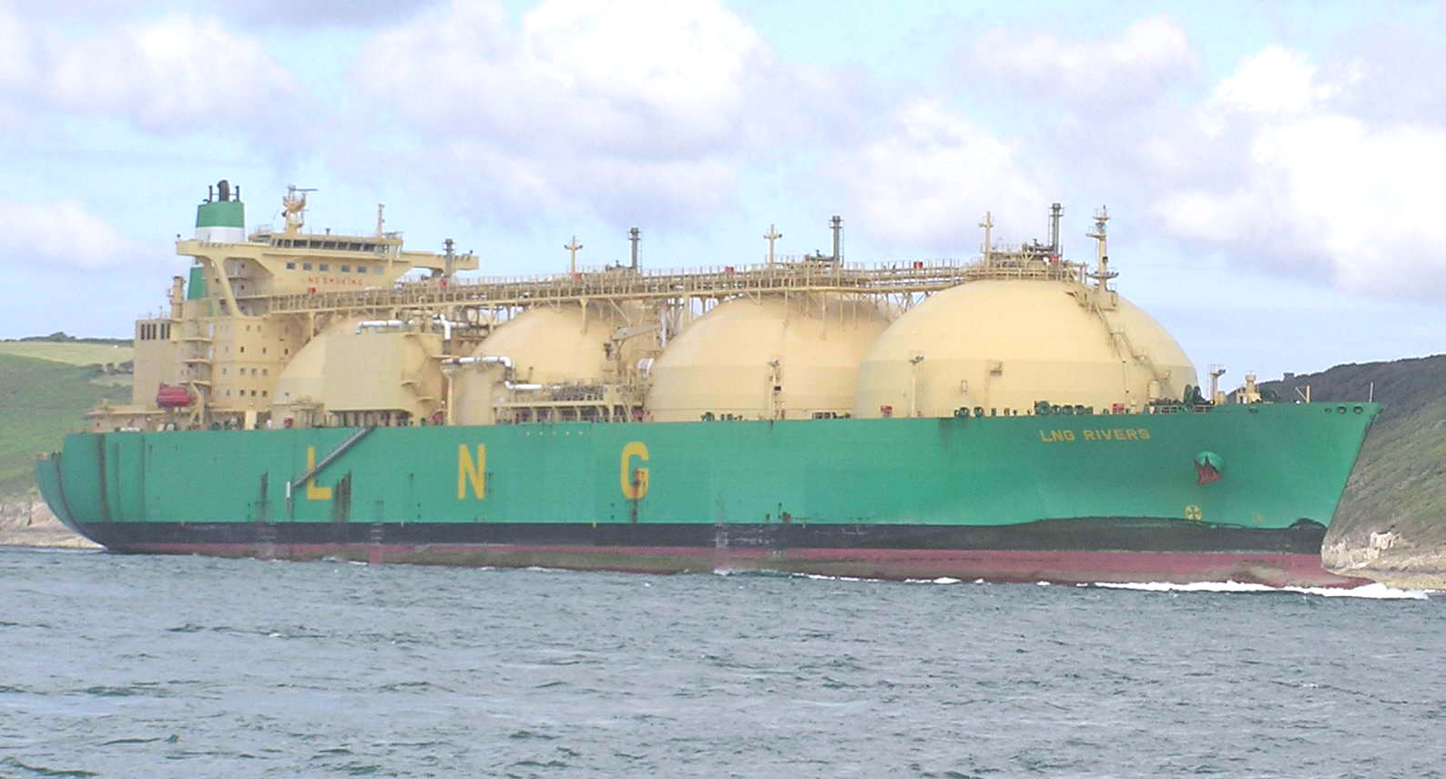 A liquefied natural gas carrier ship with spherical storage tanks at sea