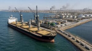 Cargo vessel and humanitarian supply corridor carrying food, agricultural inputs and fuel during conflict disruption