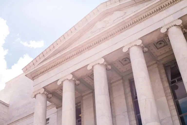 The columned facade of a public institution