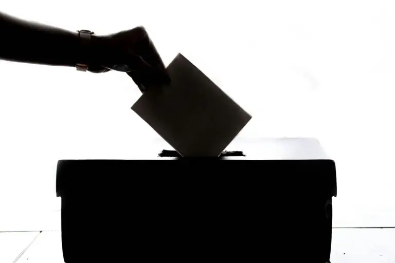 A ballot being placed into a sealed box