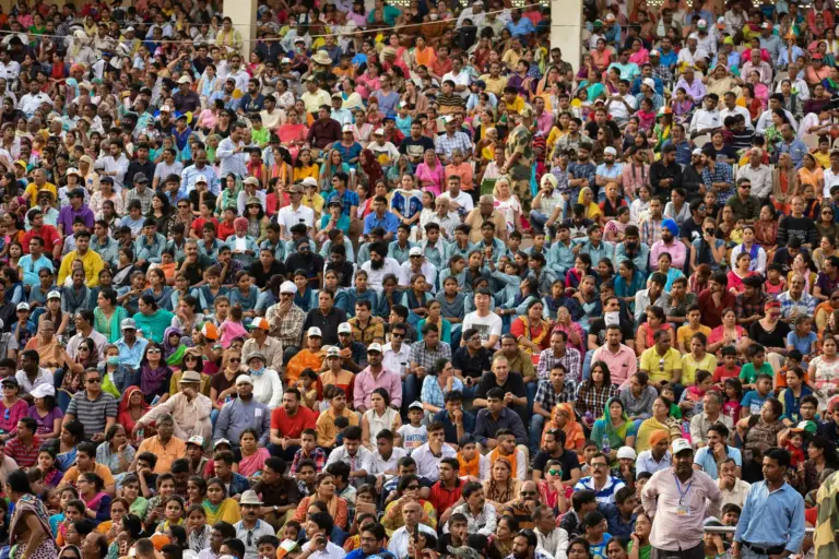 A mixed crowd of people in an Indian street