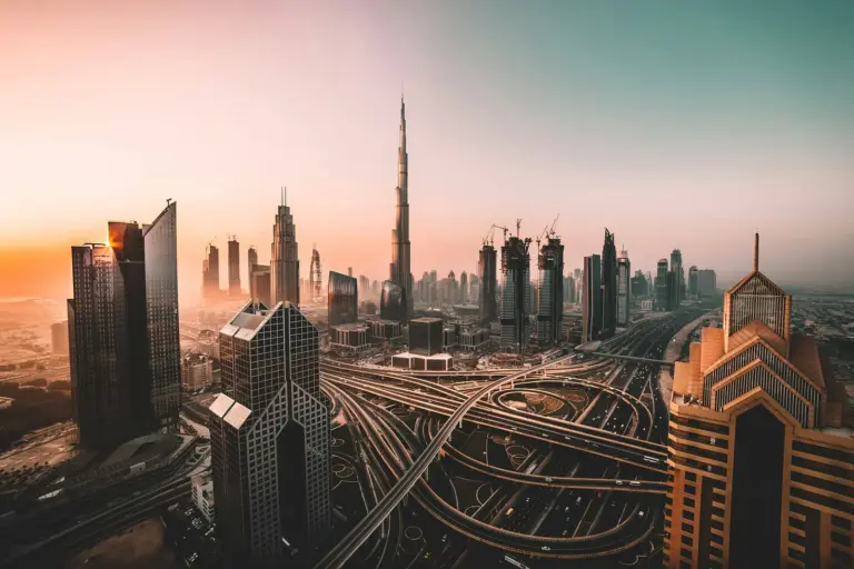 The Dubai skyline across the creek at dusk