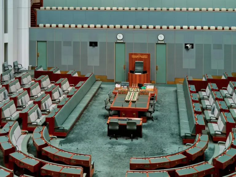 Empty benches in a legislative chamber