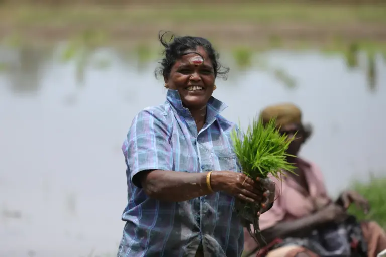 Farmers waiting outside a village cooperative office