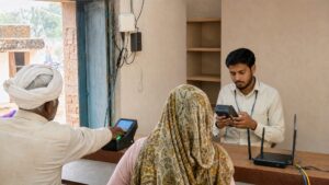 Rural customers using a Business Correspondent banking outlet in India