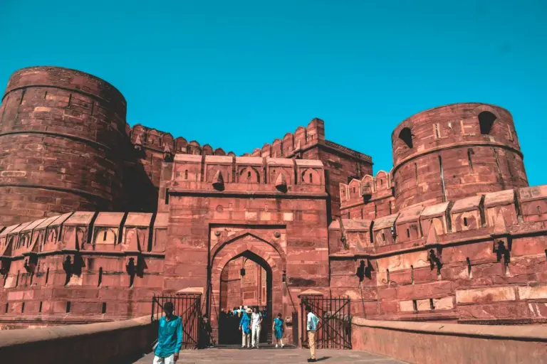 Red sandstone ramparts and gateway towers of Agra Fort on the Yamuna in Uttar Pradesh