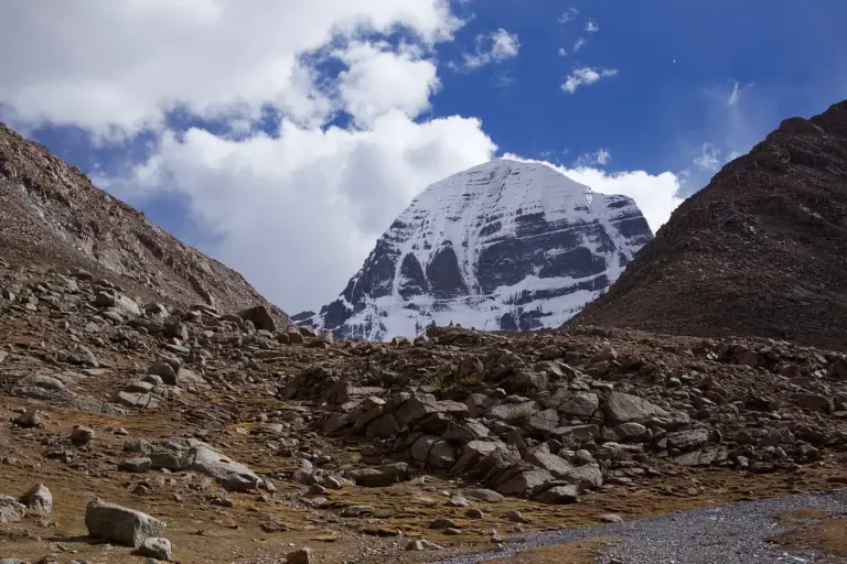 The north face of Mount Kailash rising above the Tibetan plateau. Photo: Jean-Marie Hullot, CC BY-SA 4.0, via Wikimedia Commons.