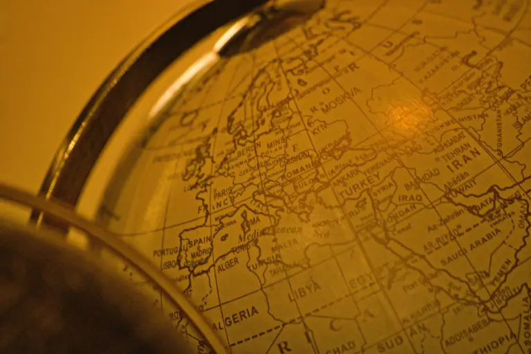 Close-up of a vintage globe showing Europe and North Africa. Photo by Dorian Labbe on Unsplash.