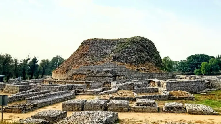 The ruined Dharmarajika stupa and monastery foundations at Taxila, Pakistan