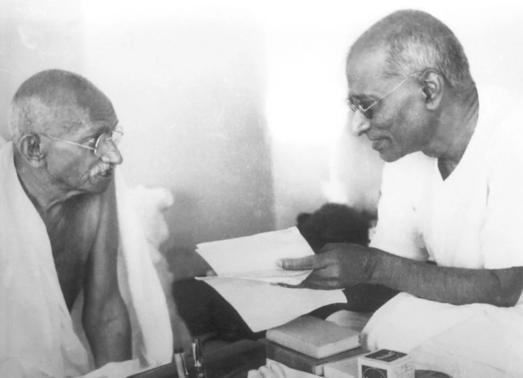 Mahatma Gandhi and C. Rajagopalachari reading papers together during the Gandhi-Jinnah talks in Bombay in September 1944.